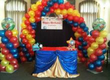 Carnival Theme Multicolored Balloon Pillars & Arch