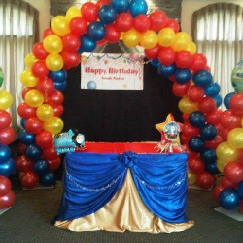 Carnival Theme Multicolored Balloon Pillars & Arch